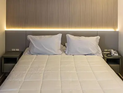 Uma cama ou camas num quarto em Flats Four Seasons by RD Stays