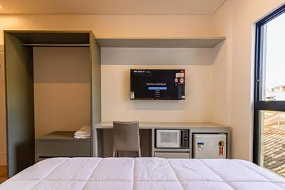Uma cama ou camas num quarto em Flats Four Seasons by RD Stays