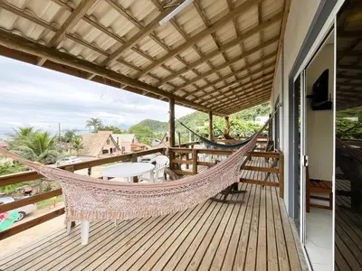 Uma varanda ou terraço em Loft Sol e Mar Exclusivo em Bombinhas 50m da praia