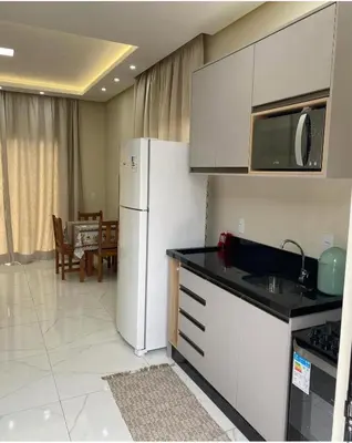 A cozinha ou kitchenette de Loft Sol e Mar Exclusivo em Bombinhas 50m da praia