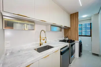 A cozinha ou kitchenette de Apto Novo - 400m da praia de Palmas - 0152