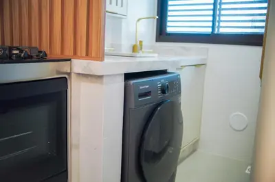 A cozinha ou kitchenette de Apto Novo - 400m da praia de Palmas - 0152