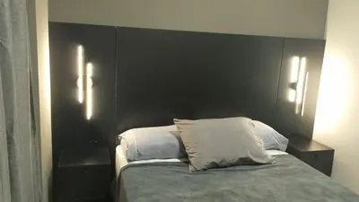 Uma cama ou camas num quarto em Sonhos