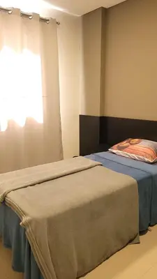 Uma cama ou camas num quarto em Sonhos