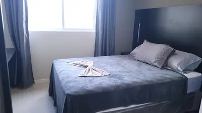 Uma cama ou camas num quarto em Sonhos