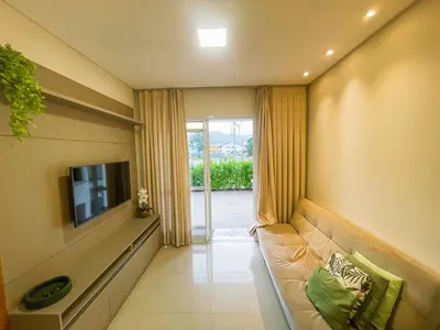 Uma televisão e/ou sistema de entretenimento em Ap com piscina privada 400m da praia de Palmas - 0163