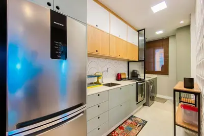 A cozinha ou kitchenette de Apto retrô na Praia de Palmas - 0184