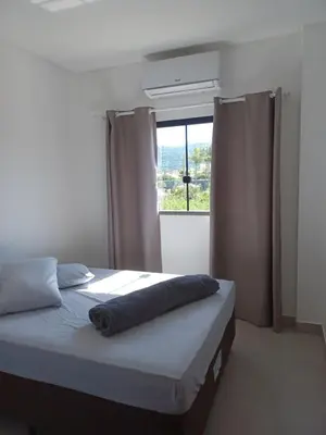 Uma cama ou camas num quarto em Dumar residencial