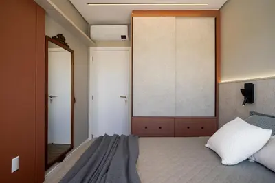 Uma cama ou camas num quarto em Apto Garden na Praia de Palmas - 0185