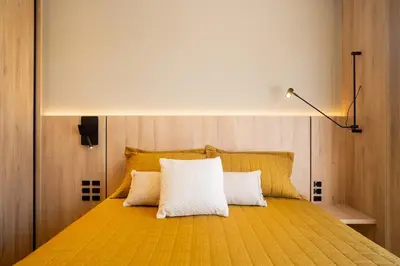 Uma cama ou camas num quarto em Apto Garden na Praia de Palmas - 0185