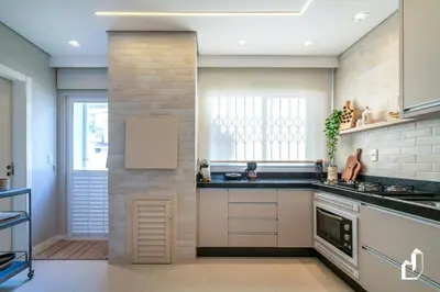 A cozinha ou kitchenette de Condomínio com piscina e saída direta para a praia