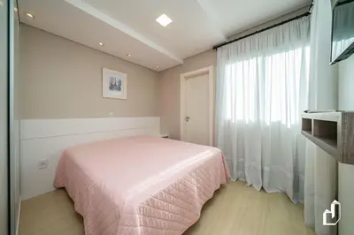 Uma cama ou camas num quarto em Condomínio com piscina e saída direta para a praia