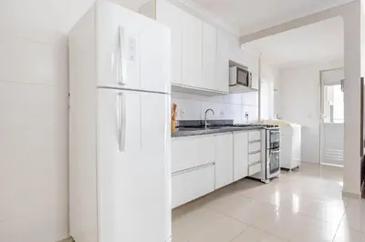 A cozinha ou kitchenette de Apartamento Aconchegante na Praia de Bombas