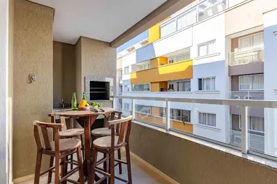 Uma varanda ou terraço em Apartamento Aconchegante na Praia de Bombas