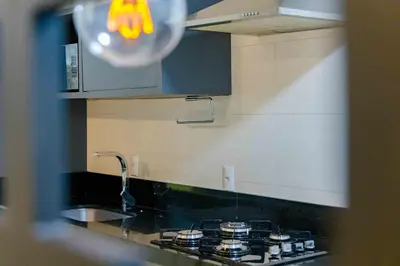 A cozinha ou kitchenette de Apartamento a 150 Metros da Praia de Bombinhas