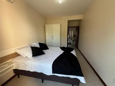 Uma cama ou camas num quarto em Cód 179 - Apartamento a 70m do mar com 2 dormitórios em Palmas