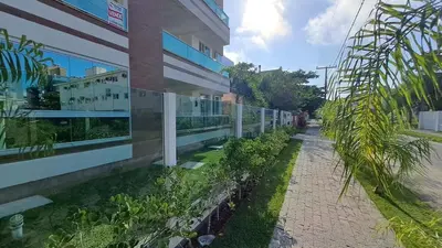 Um jardim no exterior de Apartamento amplo no Paraíso Palmas 450m da praia