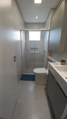 Uma casa de banho em Apartamento na praia de Palmas em Governador Celso Ramos