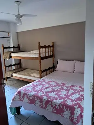 Uma cama ou camas num quarto em Apartamento de 35 m2 em Itapema