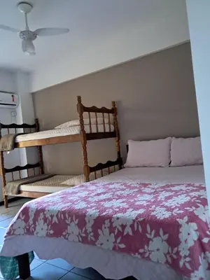 Uma cama ou camas num quarto em Apartamento de 35 m2 em Itapema
