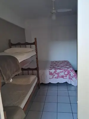 Uma cama ou camas num quarto em Apartamento de 35 m2 em Itapema