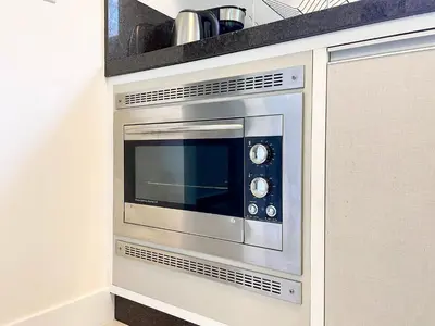 A cozinha ou kitchenette de Meia Praia Rua 292 - 3 Suítes próximo Mar AT001