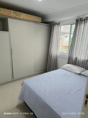 Uma cama ou camas num quarto em AP Maria Augusta
