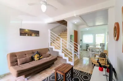 Uma área de estar em cod 138 Apartment townhouse Bombas Beach