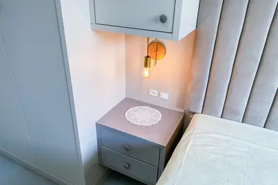 Uma cama ou camas num quarto em Praia de Palmas - Novo 200m do Mar com Piscina - 0490