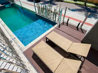 A piscina em ou perto de Praia de Palmas - Novo 200m do Mar com Piscina - 0490