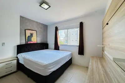 Uma cama ou camas num quarto em Praia de Palmas - 400 metros da praia - 0479