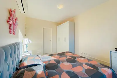 Uma cama ou camas num quarto em Praia de Palmas - Lindo Apto a 450m do Mar - 0493