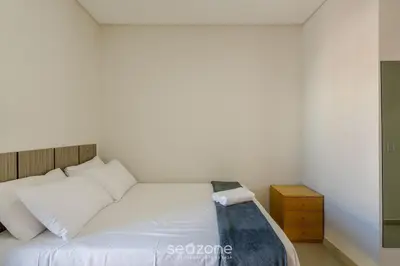 Uma cama ou camas num quarto em Casa c/ 2 Suítes e Churrasqueira LRM0226