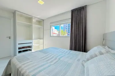Uma cama ou camas num quarto em Praia de Palmas - 80 metros da praia - 0496