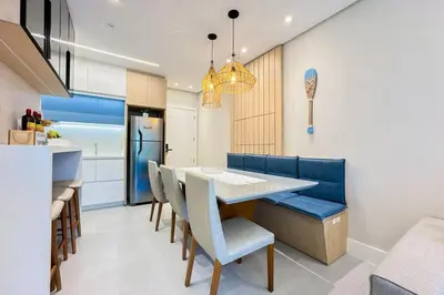 A cozinha ou kitchenette de Praia de Palmas - 350m do mar - Apto garden - 0498