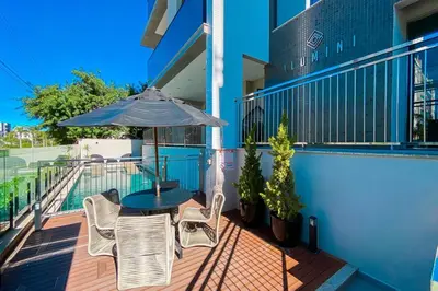 Uma varanda ou terraço em Praia de Palmas - 350m do mar - Apto garden - 0498