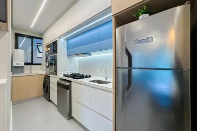 A cozinha ou kitchenette de Praia de Palmas - 350m do mar - Apto garden - 0498