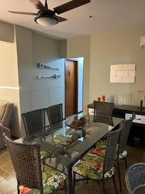 Uma área de estar em Apartamento com 03 dormitórios