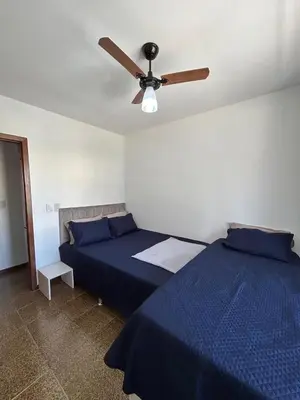 Uma cama ou camas num quarto em Apartamento com 03 dormitórios