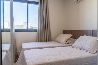 Uma cama ou camas num quarto em Cobertura duplex com 02 suítes