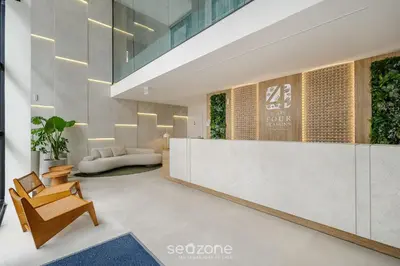 Uma área de estar em Studio c/ churrasqueira a 220m da Praia SFR0302