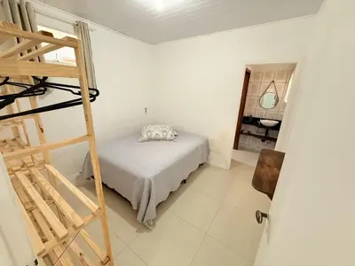 Uma cama ou camas num quarto em Casa Bacupari - 3 Quartos