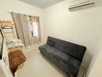 Uma área de estar em Casa Bacupari - 3 Quartos
