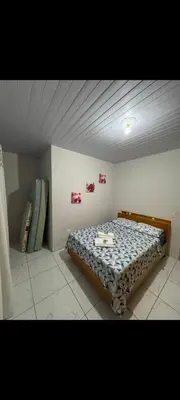 Uma cama ou camas num quarto em Apartamento Varandas 2