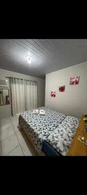 Uma cama ou camas num quarto em Apartamento Varandas 2