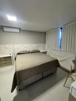 Uma cama ou camas num quarto em #Duplex vista Mar em Canto Grande -Refugio e Mar
