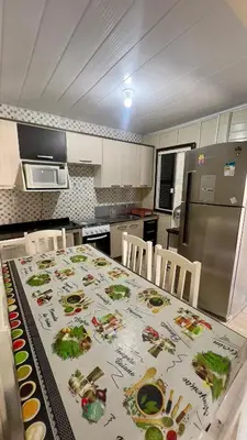 A cozinha ou kitchenette de Recanto Silveira 150 metros da Praia Canto Grande Mar de Fora( Mariscal )