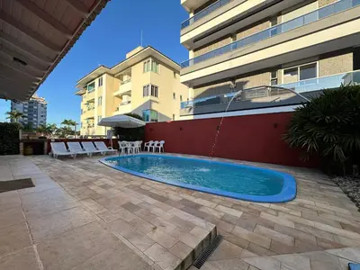 A piscina em ou perto de CASA PINHEIROS - Casa na Praia de Palmas com 4 Dormitórios e Piscina
