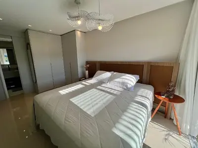 Uma cama ou camas num quarto em Residencial Vienna Park