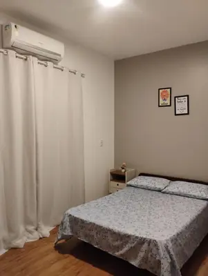 Uma cama ou camas num quarto em Casa Morrinhos